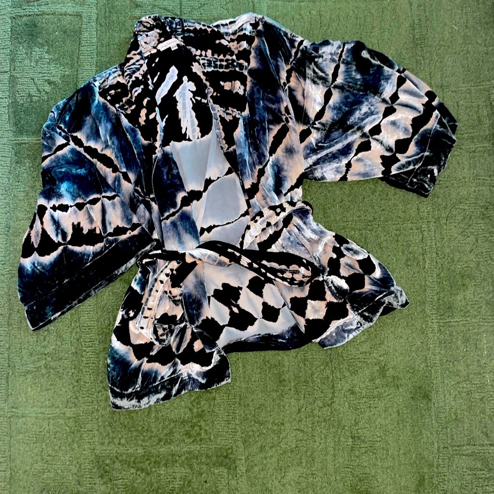 Young, fabulous, and broke velvet kimono-sash ties in the front.